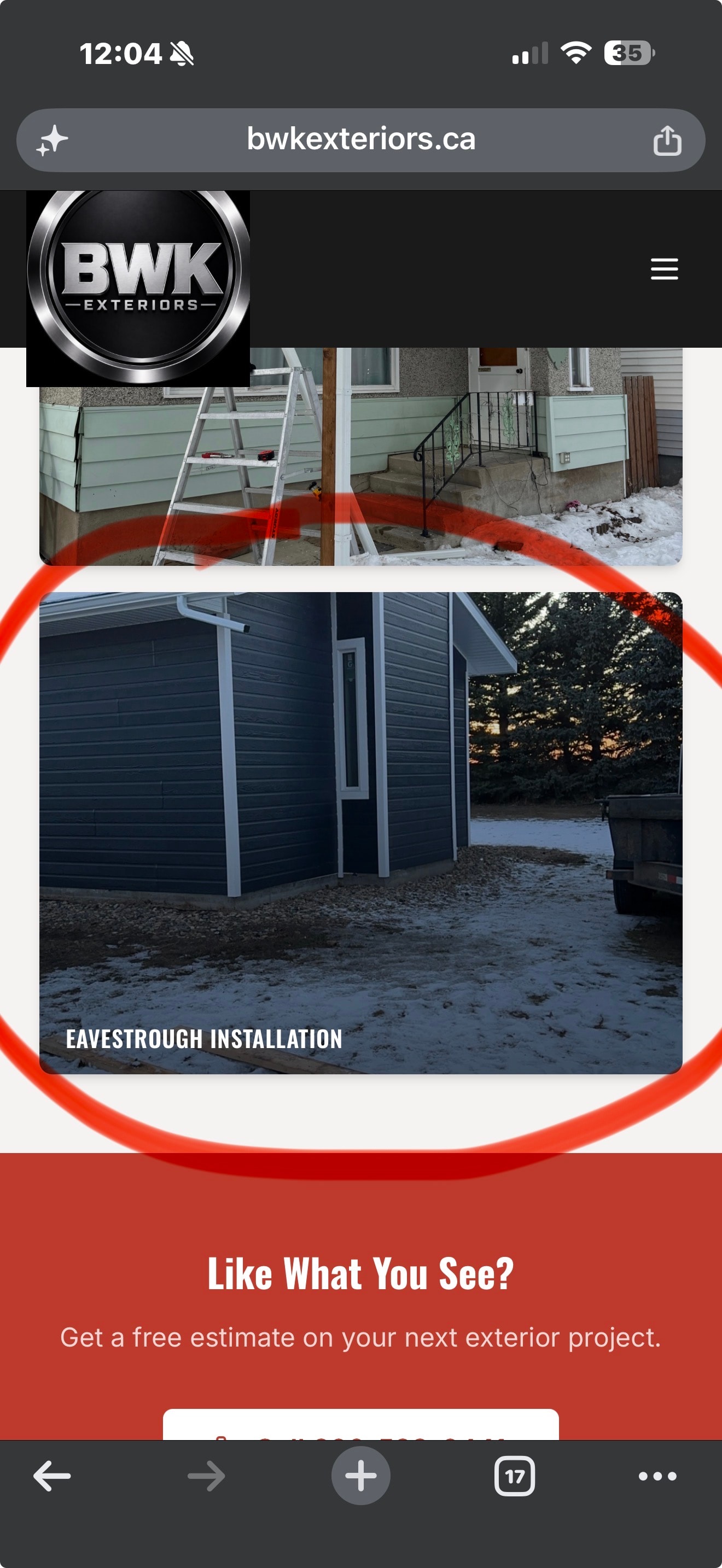 Dark charcoal vinyl siding installation with ladder — BWK Exteriors Regina